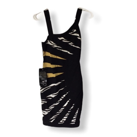 bebe Dresses & Skirts - NWT Bebe Addiction Starburst Jungle Dress